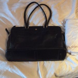 Lodi’s patin leather bag